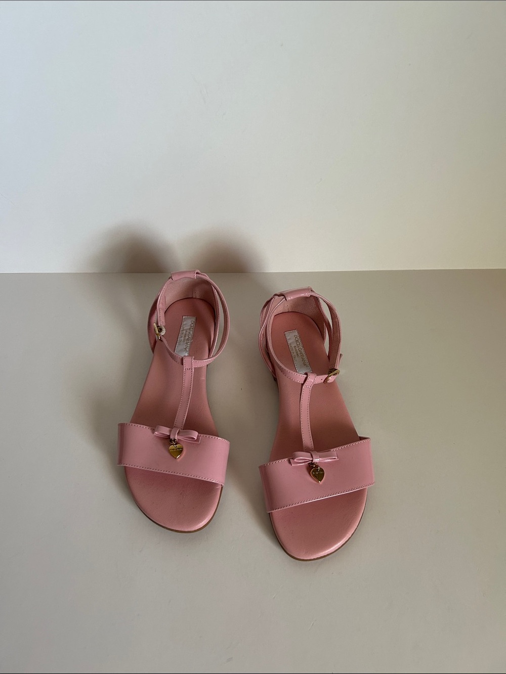 Dolce & Gabbana Pink T-Strap Sandals with Bow and Gold Heart